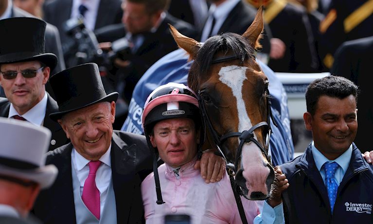 Trainer, Owner, Jockey, Stable lad and horse - all connections of Anthony Van Dyck the 2019 Investec Derby winner smiling in celebration
