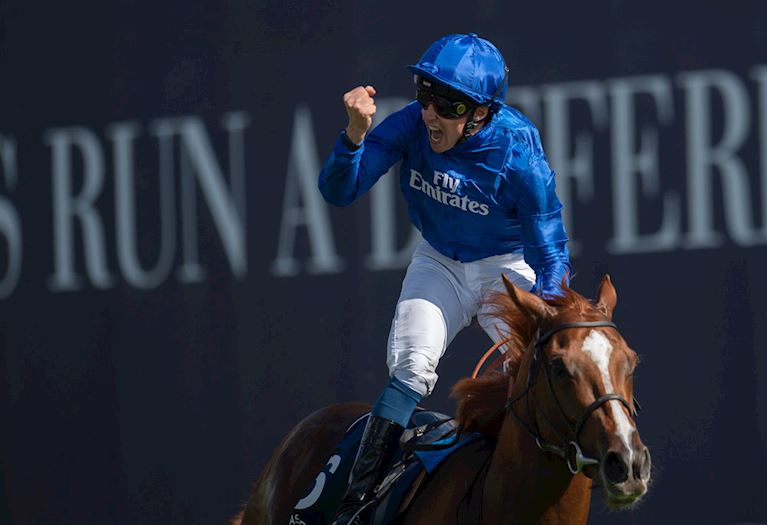 William Buick punching the air on Derby winner Masar