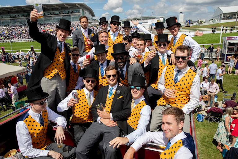 Group of men in matching outfits on Derby Day